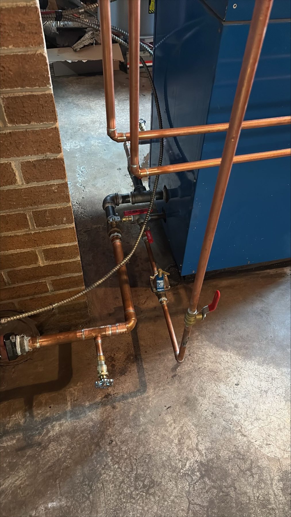 Garrett Plumbing project — fixture installation work